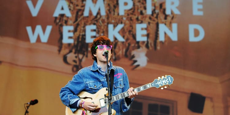 GLASTONBURY, UNITED KINGDOM - JUNE 27: Ezra Koenig of Vampire Weekend performs on the Pyramid stage during day one of the Glastonbury Festival at Worthy Farm, Pilton on June 27 2008 in Glastonbury, Somerset, England. With several thousand tickets still on sale, the controversial choice of headline acts and the bad weather of previous years have been cited as reasons for why the event has not sold out this year, the first time since 1993. (Photo by Jim Dyson/Getty Images)